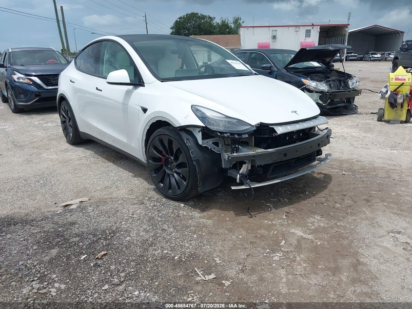 2023 Tesla Model y VIN 7SAYGDEF2PF705061 — IAAI salvage auction photo