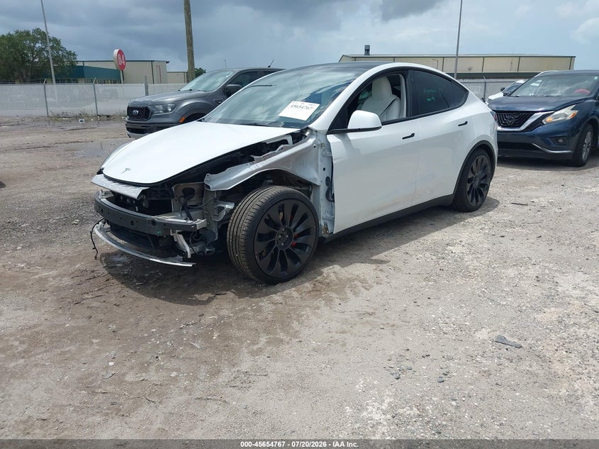 2023 Tesla Model y VIN 7SAYGDEF2PF705061 IAAI salvage auction — FRONT END, Salvage Title, sold $12,500 on 2026-08-27 (photo 2)