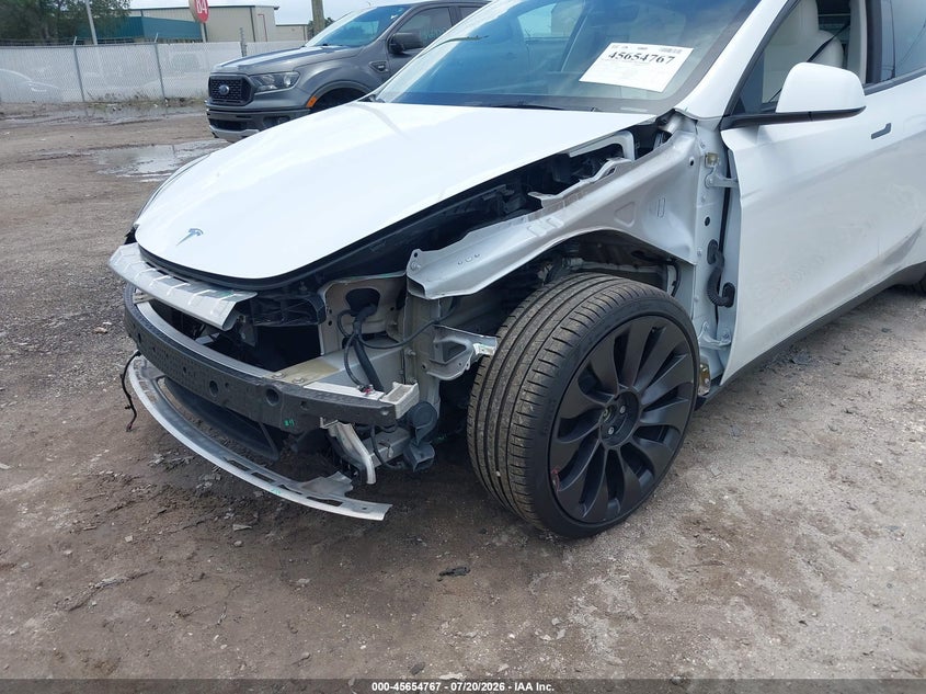 2023 Tesla Model y VIN 7SAYGDEF2PF705061 IAAI salvage auction — FRONT END, Salvage Title, sold $12,500 on 2026-08-27 (photo 6)