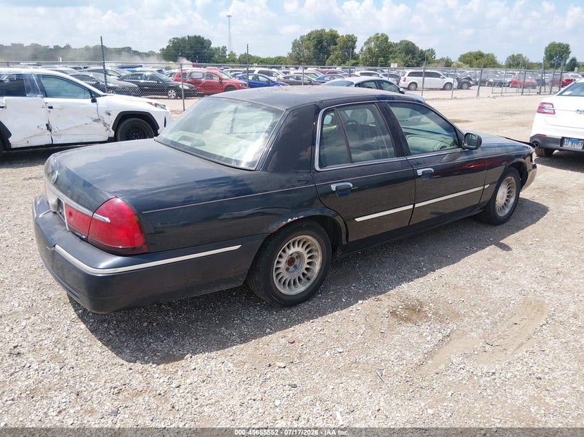 2002 Mercury Grand marquis VIN 2MEFM75W02X654374 IAAI salvage auction — NORMAL WEAR, Clear (Illinois), sold $325 on 2026-07-22 (photo 4)