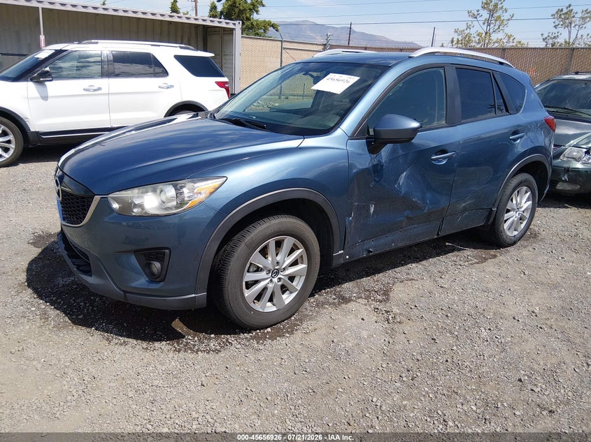 2015 Mazda Cx-5 VIN JM3KE4CY0F0458172 IAAI salvage auction — SIDE, Salvage Title, sold $2,250 on 2026-08-02 (photo 2)