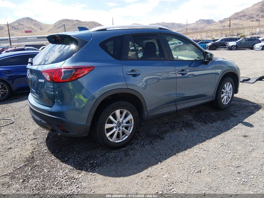 2015 Mazda Cx-5 VIN JM3KE4CY0F0458172 IAAI salvage auction — SIDE, Salvage Title, sold $2,250 on 2026-08-02 (photo 4)