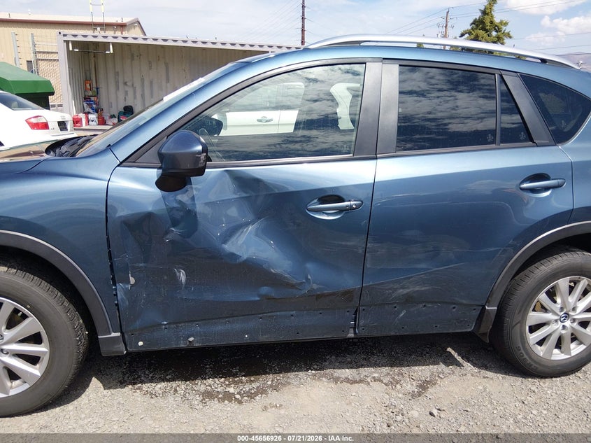 2015 Mazda Cx-5 VIN JM3KE4CY0F0458172 IAAI salvage auction — SIDE, Salvage Title, sold $2,250 on 2026-08-02 (photo 6)
