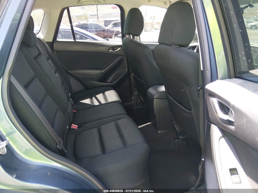 2015 Mazda Cx-5 VIN JM3KE4CY0F0458172 IAAI salvage auction — SIDE, Salvage Title, sold $2,250 on 2026-08-02 (photo 8)