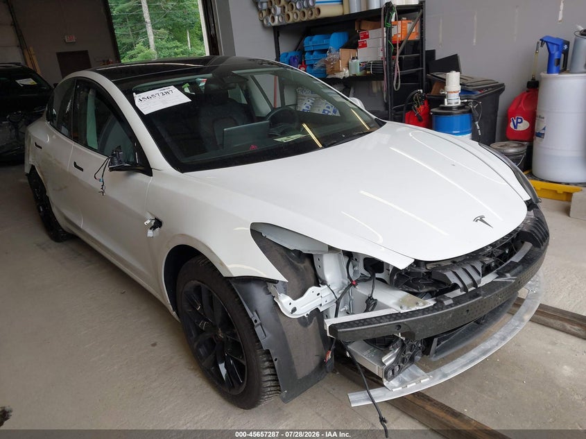2023 Tesla Model 3 VIN 5YJ3E1EC5PF503123 — IAAI salvage auction photo