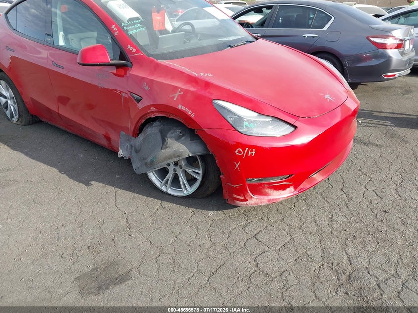 2023 Tesla Model y VIN 7SAYGAEE6PF741101 IAAI salvage auction — RIGHT FRONT, Wait Title, sold $12,500 on 2026-07-31 (photo 1)