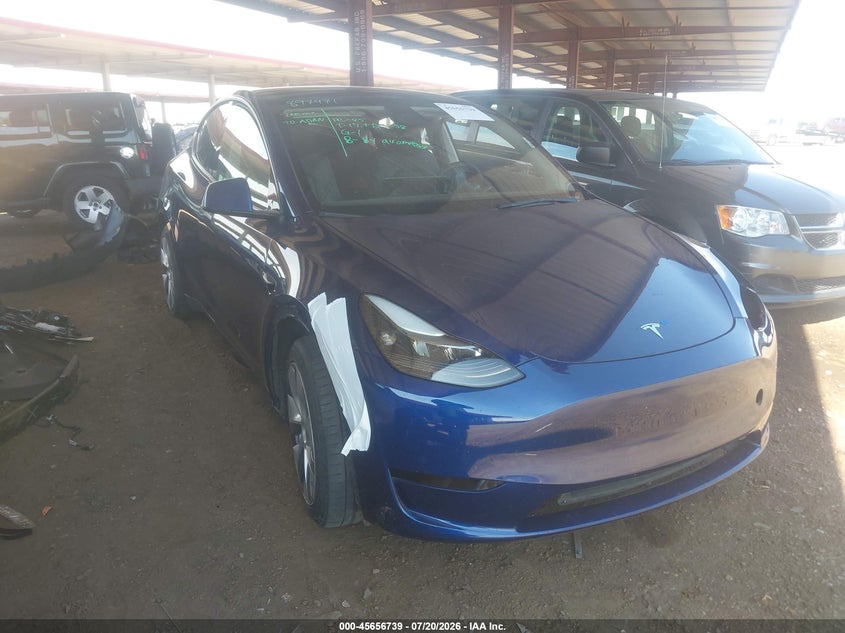 2023 Tesla Model y VIN 7SAYGAEE7PF897471 IAAI salvage auction — UNKNOWN, Salvage (Arizona), sold $10,100 on 2026-07-31 (photo 1)