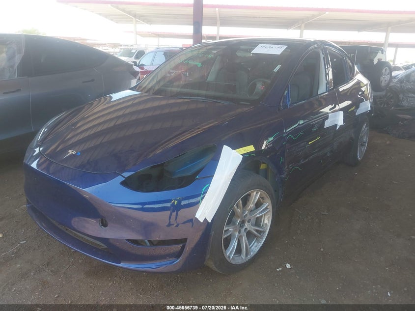 2023 Tesla Model y VIN 7SAYGAEE7PF897471 IAAI salvage auction — UNKNOWN, Salvage (Arizona), sold $10,100 on 2026-07-31 (photo 2)