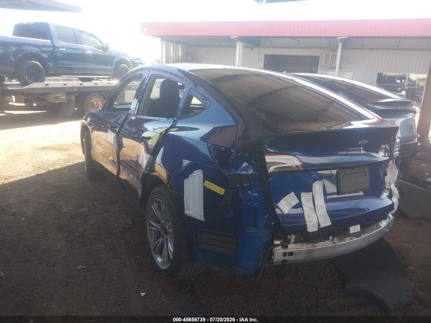 2023 Tesla Model y VIN 7SAYGAEE7PF897471 IAAI salvage auction — UNKNOWN, Salvage (Arizona), sold $10,100 on 2026-07-31 (photo 3)