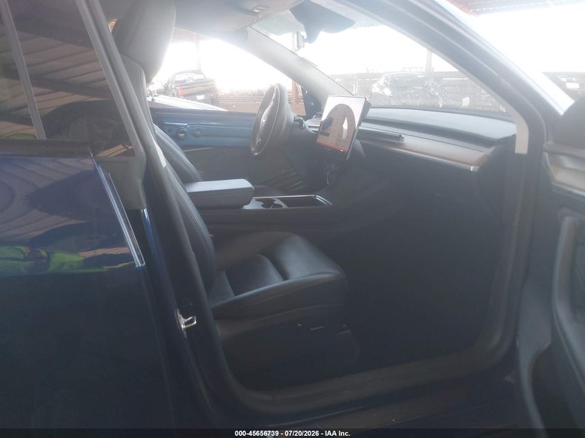2023 Tesla Model y VIN 7SAYGAEE7PF897471 IAAI salvage auction — UNKNOWN, Salvage (Arizona), sold $10,100 on 2026-07-31 (photo 5)