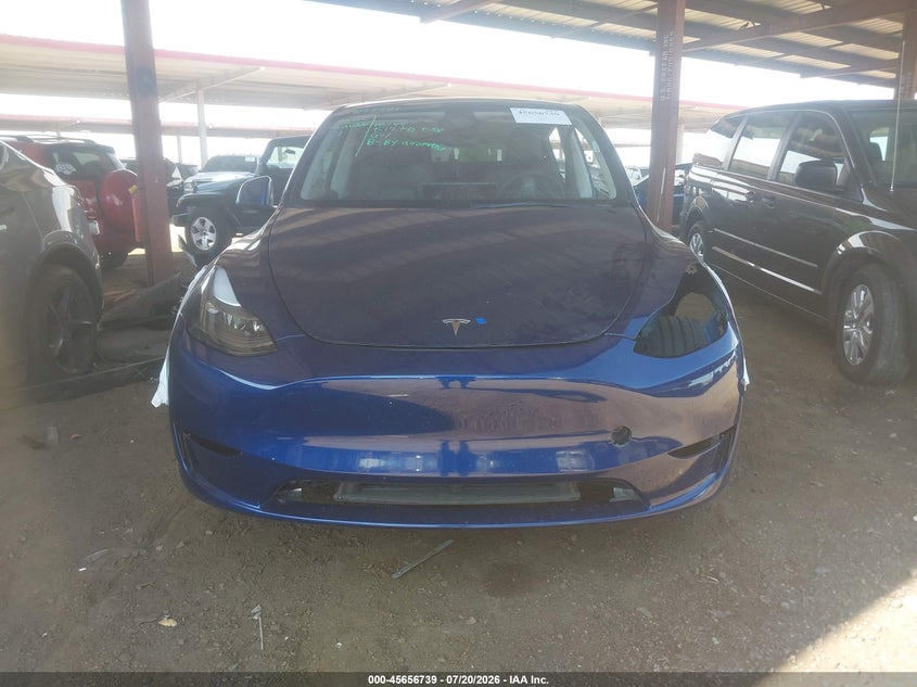 2023 Tesla Model y VIN 7SAYGAEE7PF897471 IAAI salvage auction — UNKNOWN, Salvage (Arizona), sold $10,100 on 2026-07-31 (photo 6)