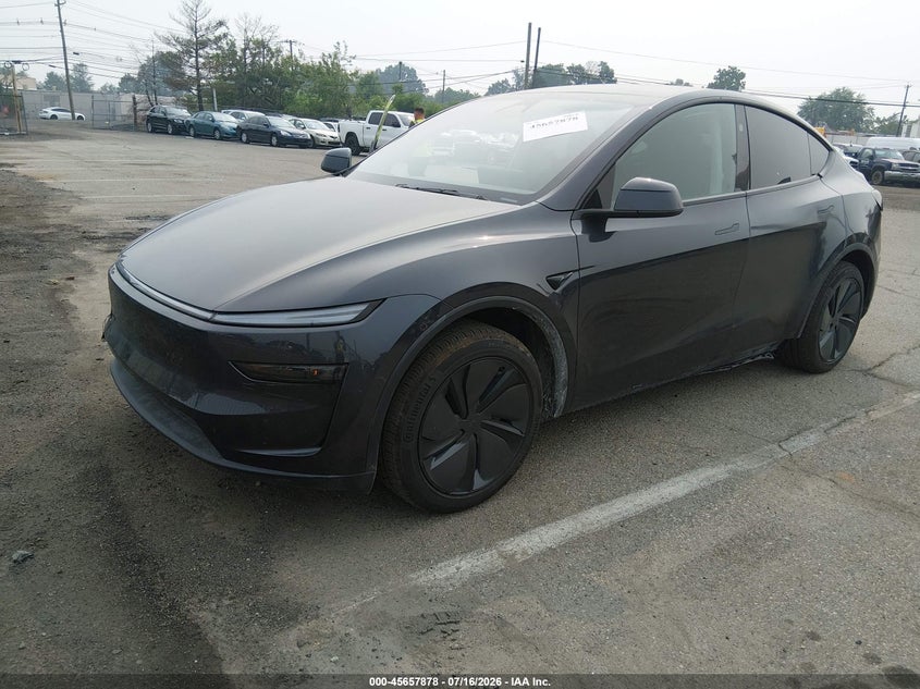 2026 Tesla Model y VIN 7SAYGDED0TF401476 IAAI salvage auction — SIDE, Salvage (Oregon), sold $18,000 on 2026-07-29 (photo 2)