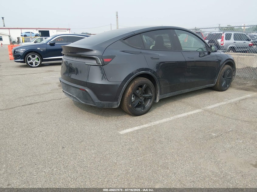2026 Tesla Model y VIN 7SAYGDED0TF401476 IAAI salvage auction — SIDE, Salvage (Oregon), sold $18,000 on 2026-07-29 (photo 4)