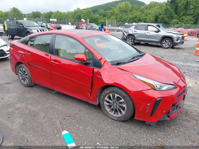 2021 Toyota Prius VIN JTDKAMFU0M3144434 — IAAI salvage auction photo