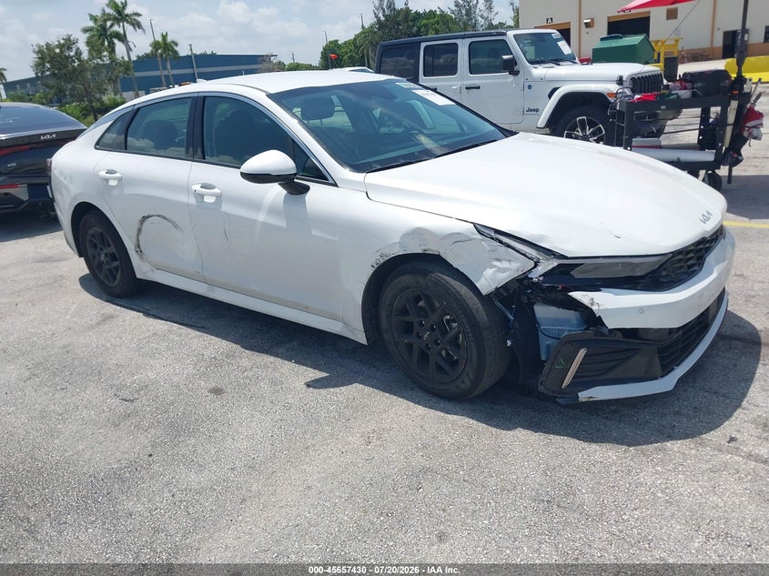 2026 Kia K5 VIN KNAG24J79T5457633 IAAI salvage auction — SIDE, Clear (Florida), sold $11,700 on 2026-07-30 (photo 1)