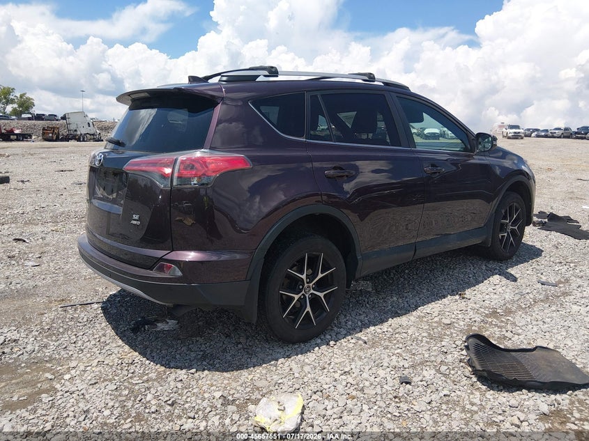 2018 Toyota Rav 4 VIN 2T3JFREV1JW828213 IAAI salvage auction — UNKNOWN, Salvage Title, sold $9,400 on 2026-07-30 (photo 4)