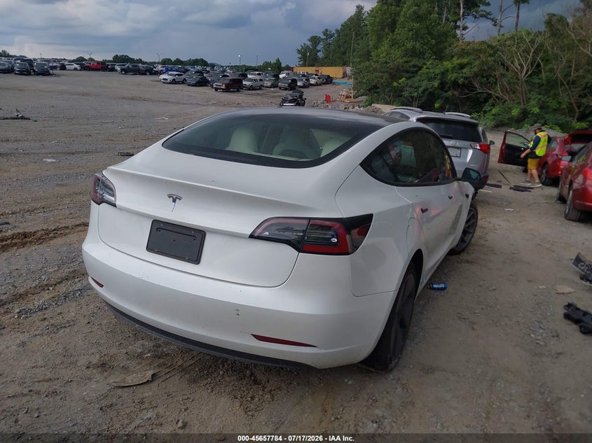 2023 Tesla Model 3 VIN 5YJ3E1EAXPF424433 IAAI salvage auction — LEFT FRONT, Wait Title, sold $5,500 on 2026-09-02 (photo 4)
