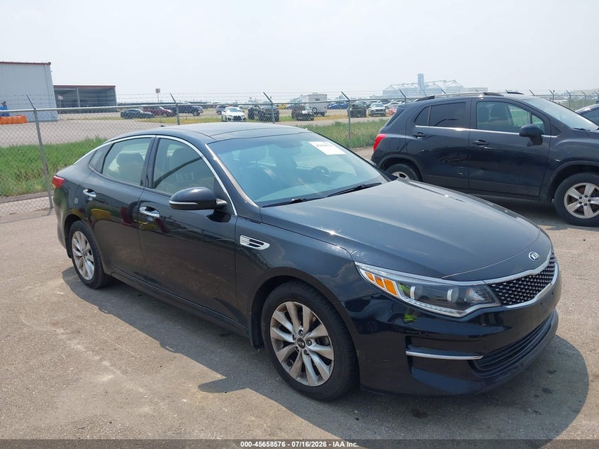 2016 Kia Optima VIN 5XXGU4L32GG074688 IAAI salvage auction — FRONT & REAR, Clear (Minnesota), sold $75 on 2026-07-29 (photo 1)