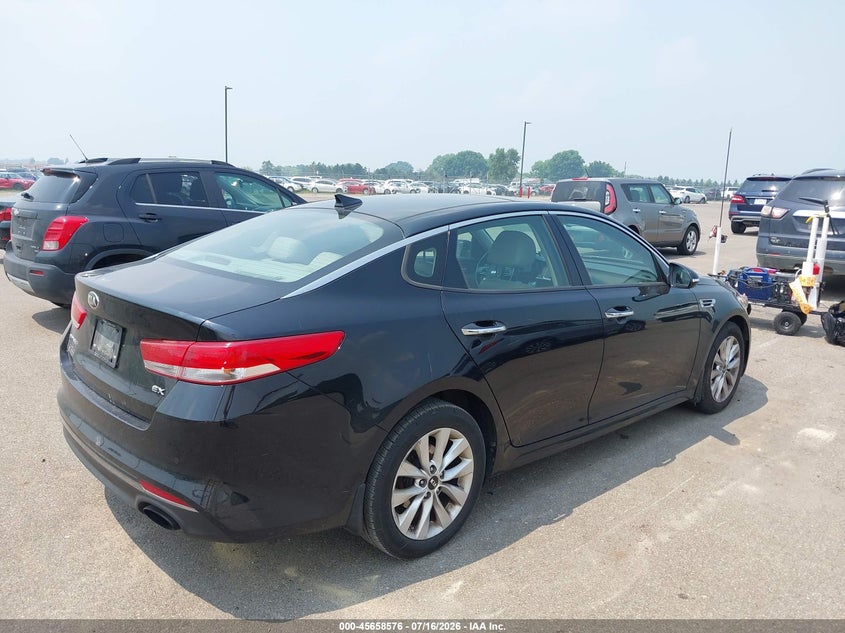 2016 Kia Optima VIN 5XXGU4L32GG074688 IAAI salvage auction — FRONT & REAR, Clear (Minnesota), sold $75 on 2026-07-29 (photo 4)