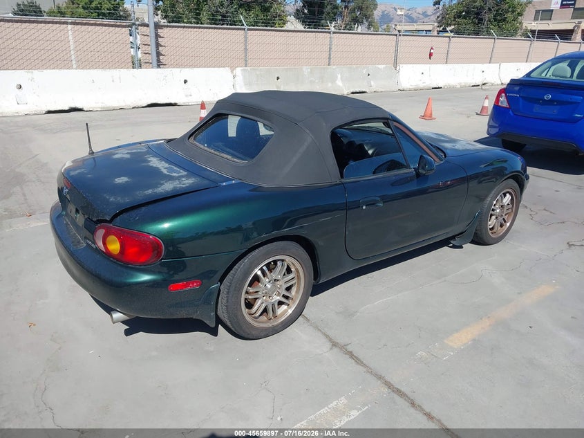 1999 Mazda Mx-5 miata VIN JM1NB353XX0123304 IAAI salvage auction — NORMAL WEAR, Clear - Dealer Only (California), sold $300 on 2026-07-29 (photo 4)