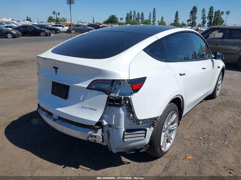 2020 Tesla Model y VIN 5YJYGDEE7LF010752 IAAI salvage auction — REAR END, Salvage Title, sold $7,950 on 2026-08-21 (photo 4)