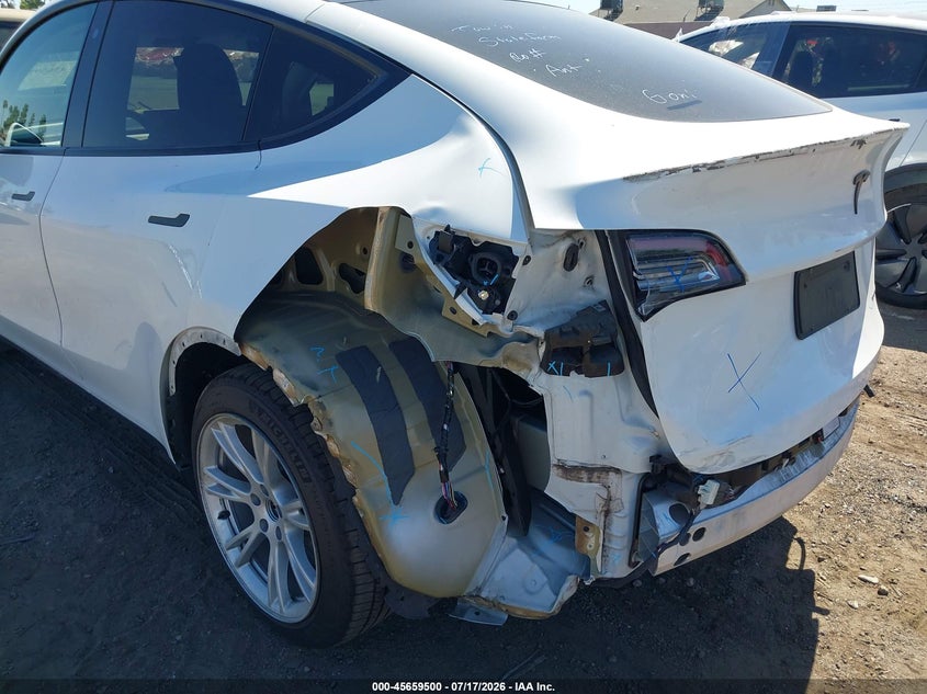 2020 Tesla Model y VIN 5YJYGDEE7LF010752 IAAI salvage auction — REAR END, Salvage Title, sold $7,950 on 2026-08-21 (photo 6)