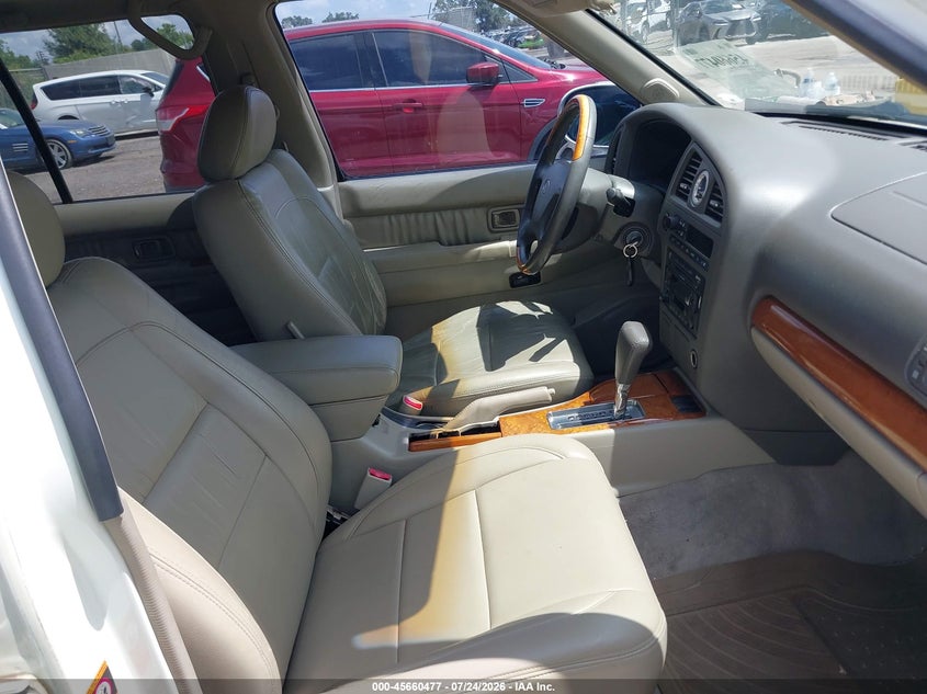2002 Infiniti Qx4 VIN JNRDR09X42W211371 IAAI salvage auction — NORMAL WEAR, Clear (Florida), sold $25 on 2026-07-29 (photo 5)