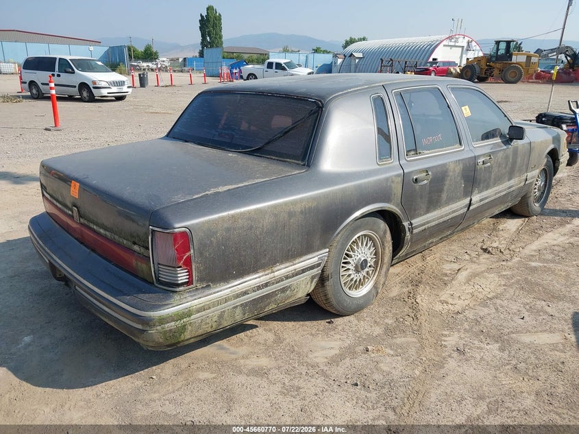 1992 Lincoln TOWN CAR VIN 1LNLM81W4NY638727 IAAI salvage auction — NORMAL WEAR, Clear (Montana), sold $25 on 2026-07-29 (photo 4)