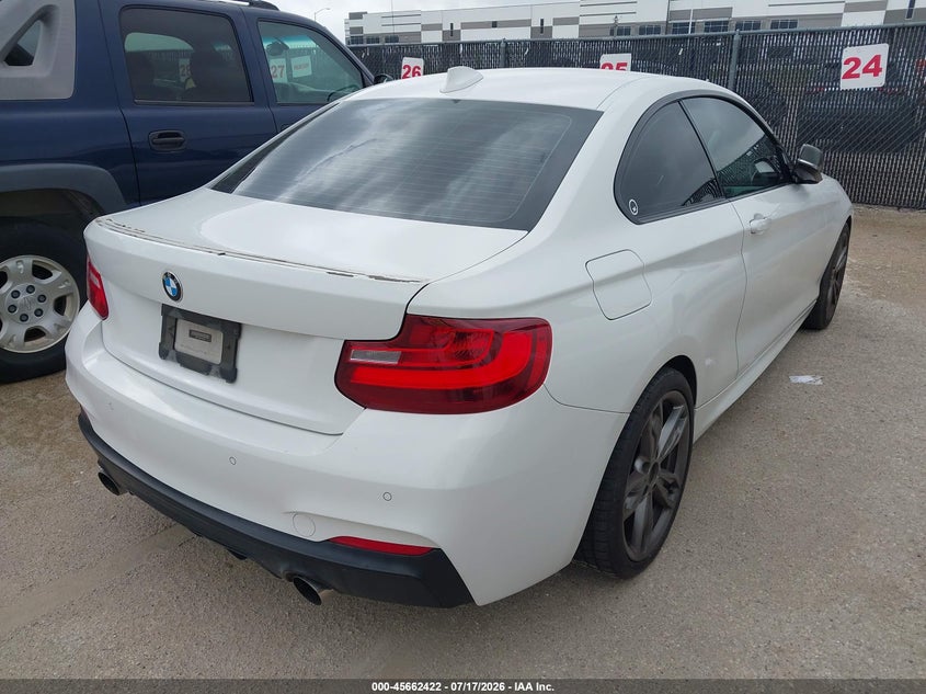 2015 BMW 2er VIN WBA1J7C56FV358410 IAAI salvage auction — NORMAL WEAR, Original (Texas), sold $2,150 on 2026-07-28 (photo 4)