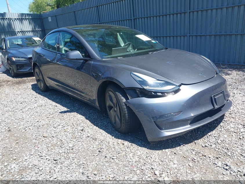 2021 Tesla Model 3 VIN 5YJ3E1EB4MF063236 — IAAI salvage auction photo