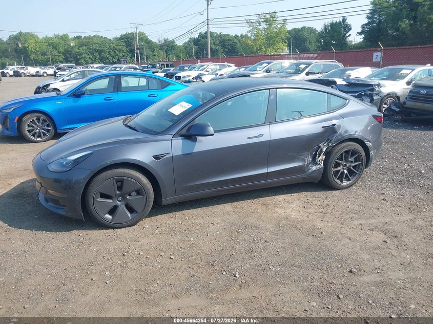 2023 Tesla Model 3 VIN 5YJ3E1EA2PF701799 IAAI salvage auction — LEFT SIDE, Wait Title, sold $9,750 on 2026-09-09 (photo 6)