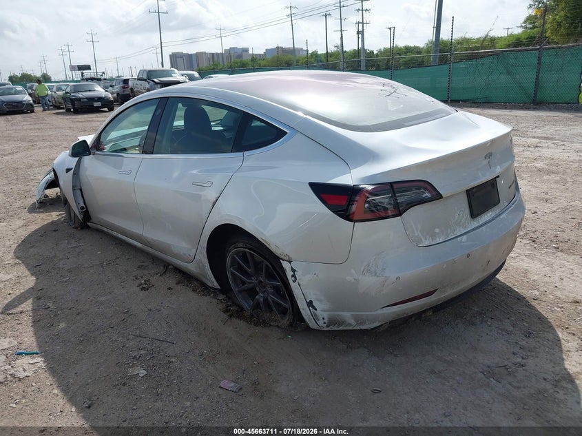 2019 Tesla Model 3 VIN 5YJ3E1EB9KF151051 IAAI salvage auction — FRONT & REAR, Salvage Title, sold $2,500 on 2026-09-21 (photo 3)