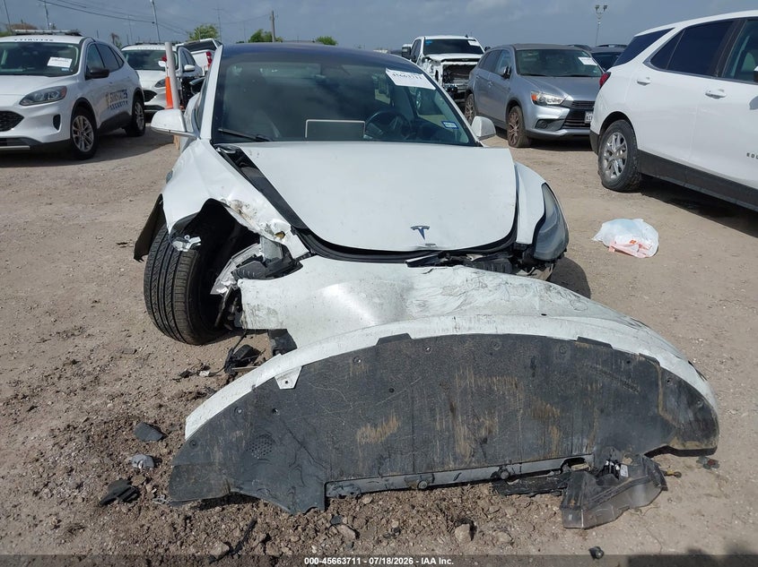 2019 Tesla Model 3 VIN 5YJ3E1EB9KF151051 IAAI salvage auction — FRONT & REAR, Salvage Title, sold $2,500 on 2026-09-21 (photo 6)