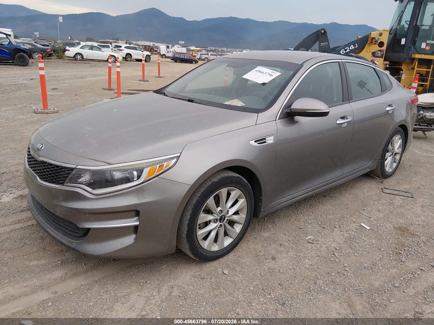 2016 Kia Optima VIN 5XXGT4L33GG043999 IAAI salvage auction — NORMAL WEAR, Clear (Montana), sold $850 on 2026-07-29 (photo 2)