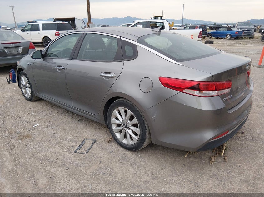 2016 Kia Optima VIN 5XXGT4L33GG043999 IAAI salvage auction — NORMAL WEAR, Clear (Montana), sold $850 on 2026-07-29 (photo 3)