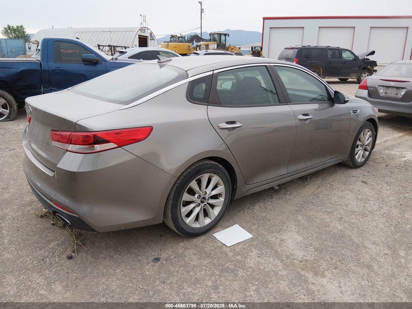 2016 Kia Optima VIN 5XXGT4L33GG043999 IAAI salvage auction — NORMAL WEAR, Clear (Montana), sold $850 on 2026-07-29 (photo 4)
