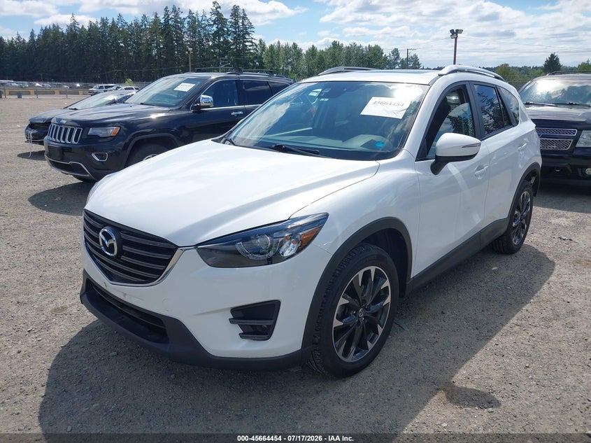 2016 Mazda Cx-5 VIN JM3KE4DY3G0671052 IAAI salvage auction — REAR END, Salvage Title, sold $4,450 on 2026-08-01 (photo 2)