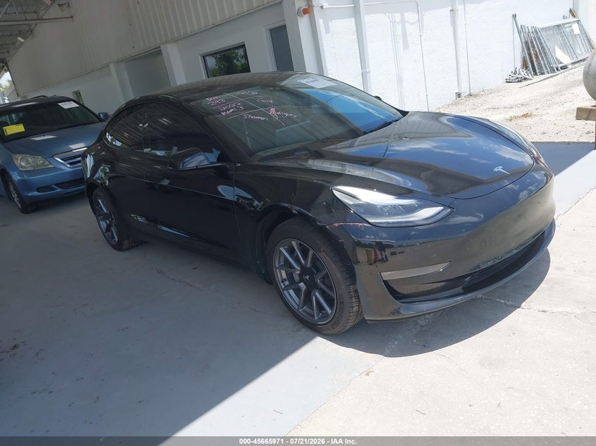 2022 Tesla Model 3 VIN 5YJ3E1EB5NF128340 — IAAI salvage auction photo