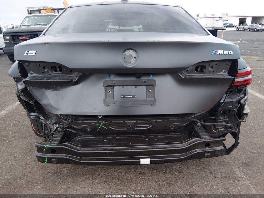 2024 BMW I5 VIN WBY43FK00RCP91648 IAAI salvage auction — REAR END, Wait Title, sold $42,600 on 2026-09-17 (photo 6)
