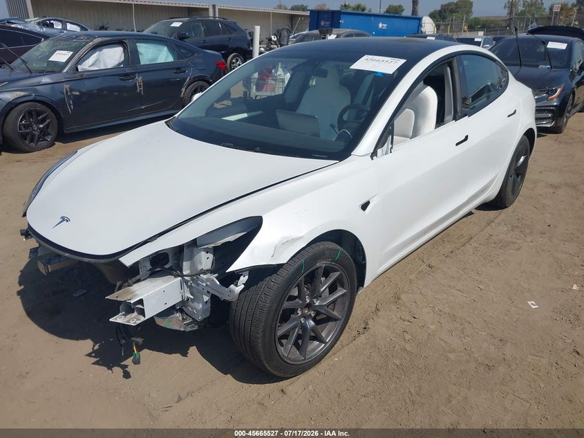 2023 Tesla Model 3 VIN 5YJ3E1EA4PF567474 IAAI salvage auction — LEFT FRONT, Salvage (California), sold $125 on 2026-07-29 (photo 2)