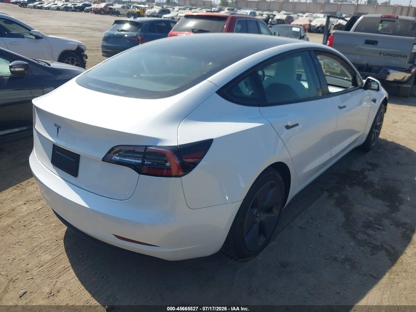2023 Tesla Model 3 VIN 5YJ3E1EA4PF567474 IAAI salvage auction — LEFT FRONT, Salvage (California), sold $125 on 2026-07-29 (photo 4)