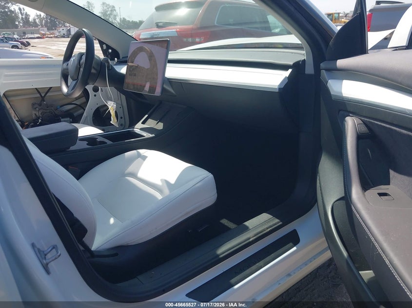 2023 Tesla Model 3 VIN 5YJ3E1EA4PF567474 IAAI salvage auction — LEFT FRONT, Salvage (California), sold $125 on 2026-07-29 (photo 5)