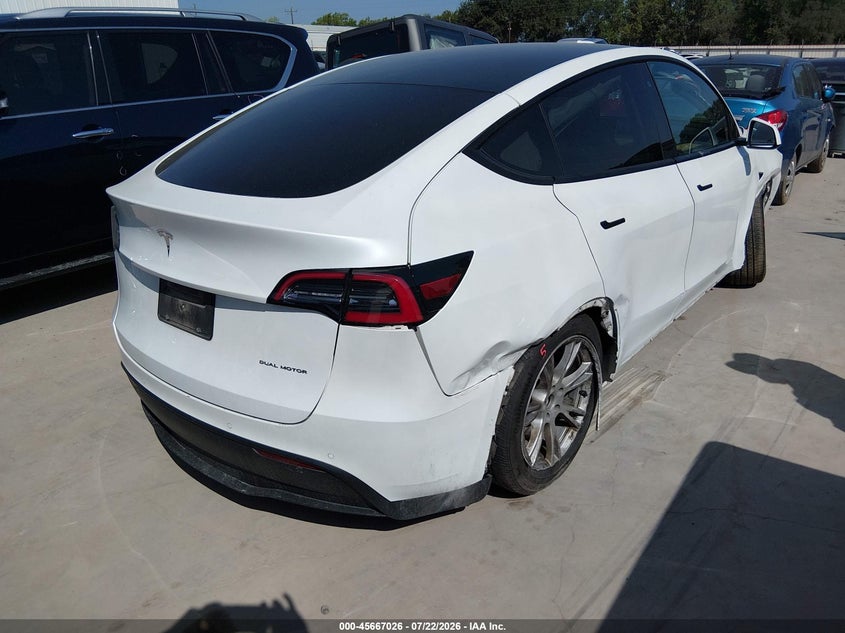 2020 Tesla Model y VIN 5YJYGDEE1LF009628 IAAI salvage auction — SIDE, Salvage Title, sold $6,600 on 2026-09-08 (photo 4)