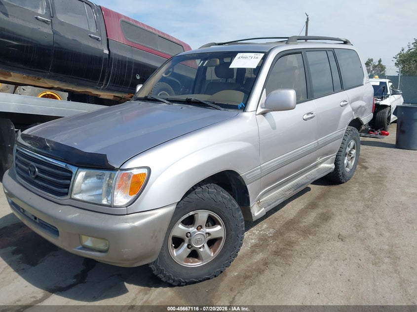 2001 Toyota Land cruiser VIN JTEHT05J712003703 IAAI salvage auction — LEFT REAR, Salvage (California), sold $525 on 2026-07-31 (photo 2)