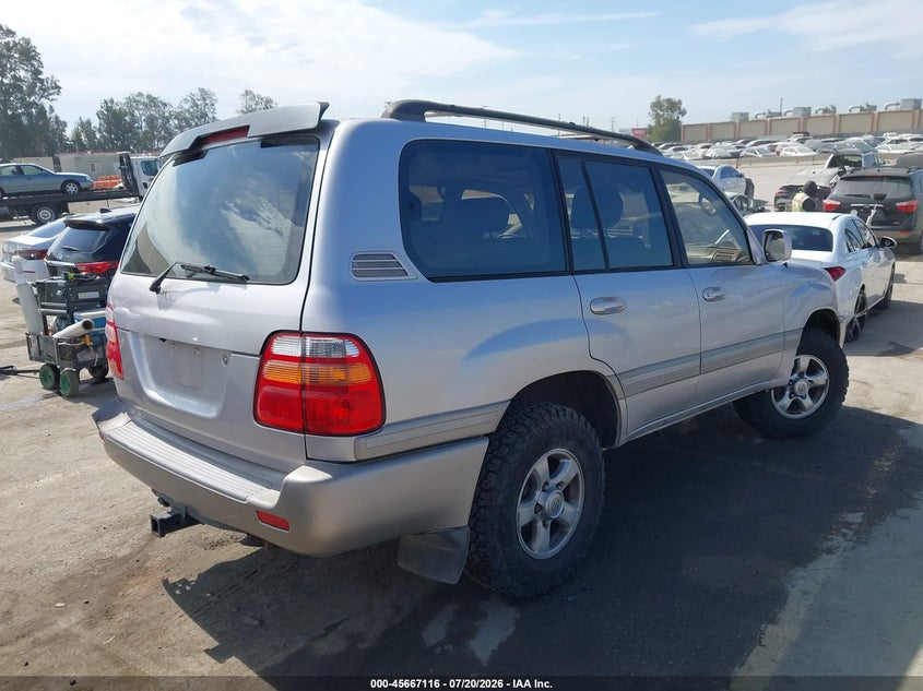 2001 Toyota Land cruiser VIN JTEHT05J712003703 IAAI salvage auction — LEFT REAR, Salvage (California), sold $525 on 2026-07-31 (photo 4)