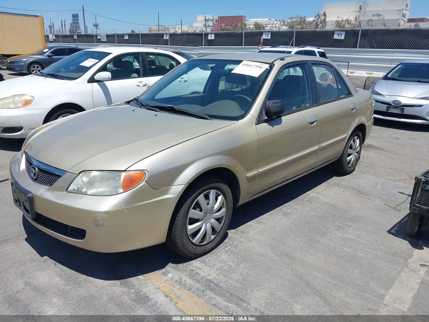 2001 Mazda Protege VIN JM1BJ222110424014 IAAI salvage auction — NORMAL WEAR, Clear - Dealer Only (California), sold $25 on 2026-07-29 (photo 2)