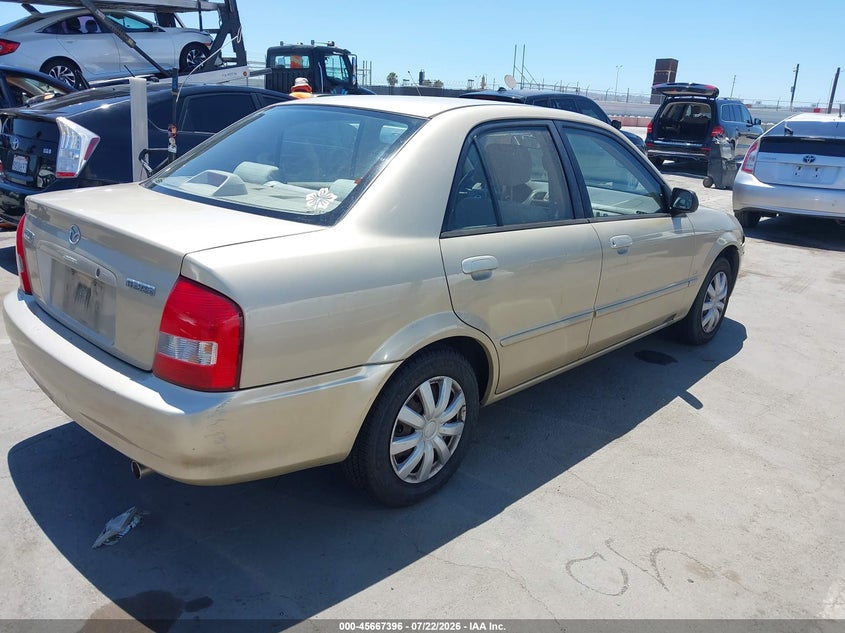2001 Mazda Protege VIN JM1BJ222110424014 IAAI salvage auction — NORMAL WEAR, Clear - Dealer Only (California), sold $25 on 2026-07-29 (photo 4)