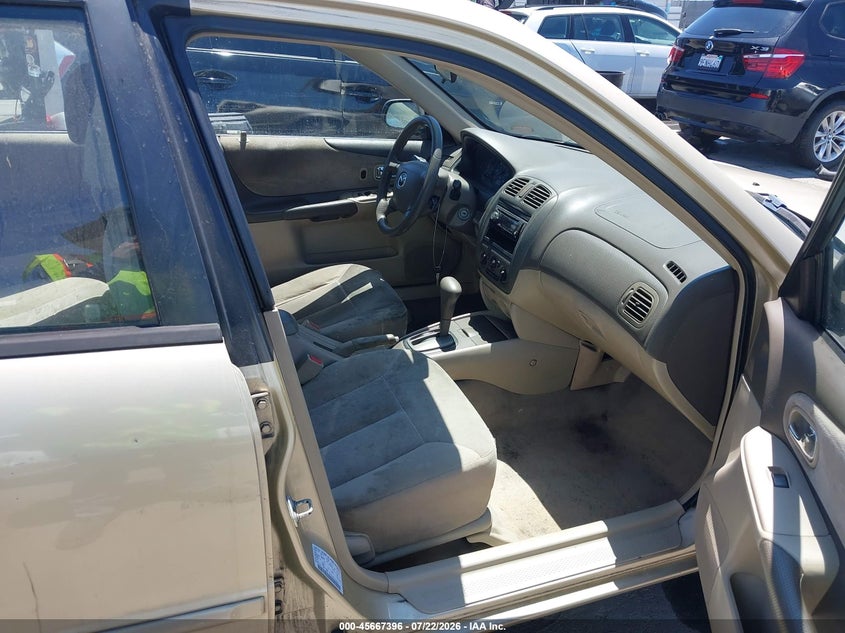 2001 Mazda Protege VIN JM1BJ222110424014 IAAI salvage auction — NORMAL WEAR, Clear - Dealer Only (California), sold $25 on 2026-07-29 (photo 5)