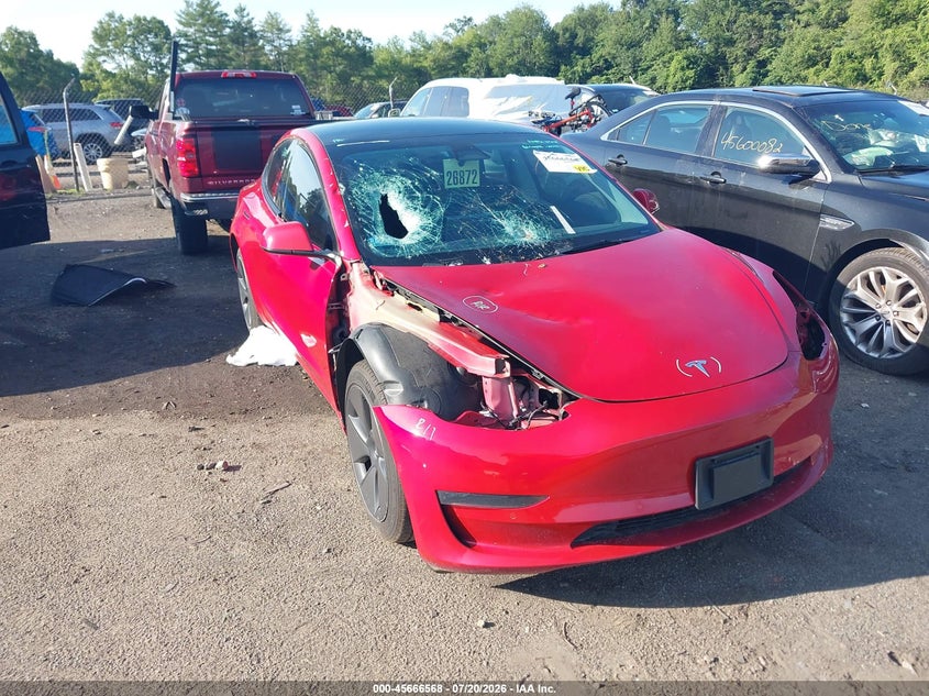 2022 Tesla Model 3 VIN 5YJ3E1EB7NF134124 — IAAI salvage auction photo