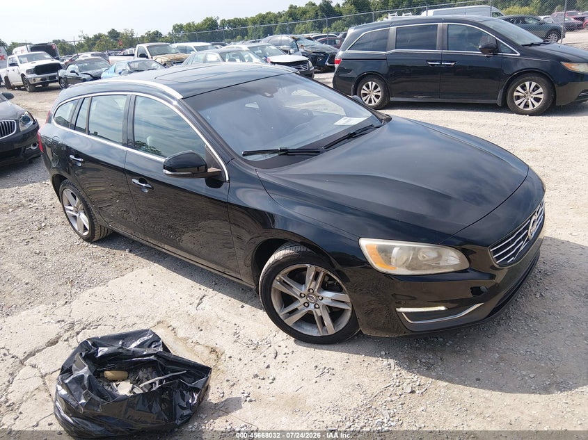 2015 Volvo V60 VIN YV140MEBXF1207429 IAAI salvage auction — LEFT FRONT, Salvage Title, sold $675 on 2026-08-17 (photo 1)
